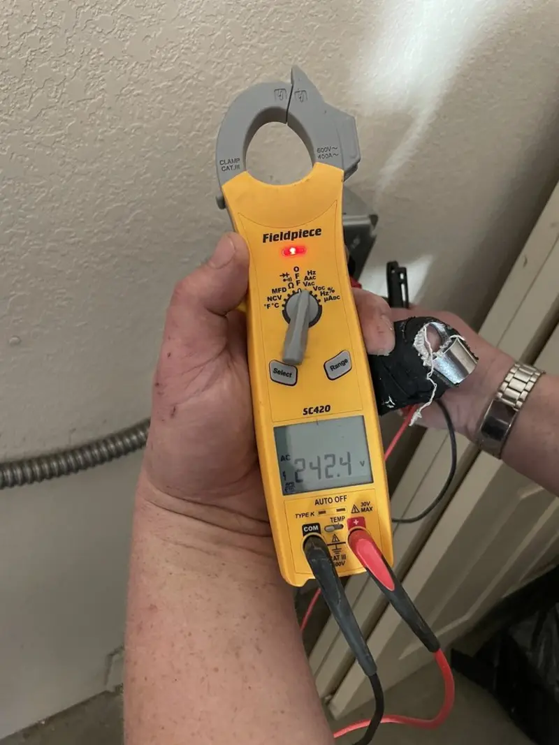 Voltage testing with clamp meter during Aluminum Wiring Replacement in La Porte